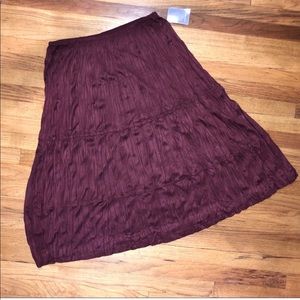 Has a soft suede feel full skirt